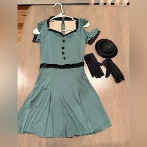 Weissman Teal Dress with leotard attached, with black details.